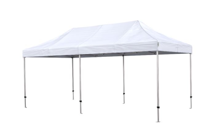 Eight shirts arranged on table in black, olive, grey, blue, white, red, mustard, and green.