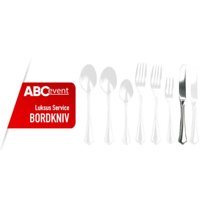 Eight shirts arranged on table in black, olive, grey, blue, white, red, mustard, and green.