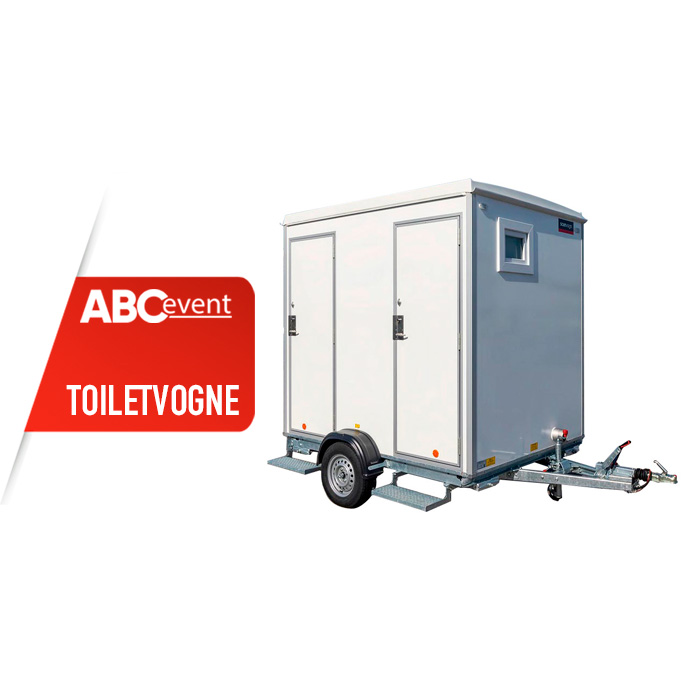 Eight shirts arranged on table in black, olive, grey, blue, white, red, mustard, and green.