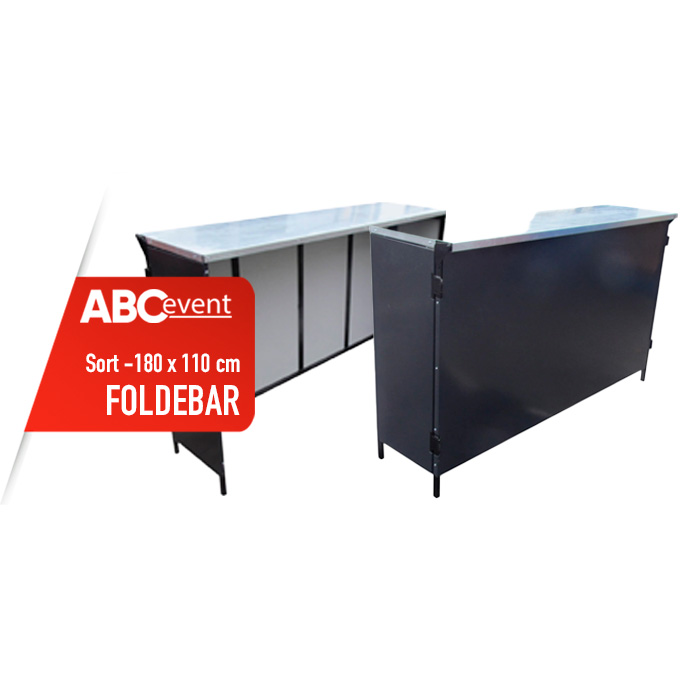 Eight shirts arranged on table in black, olive, grey, blue, white, red, mustard, and green.