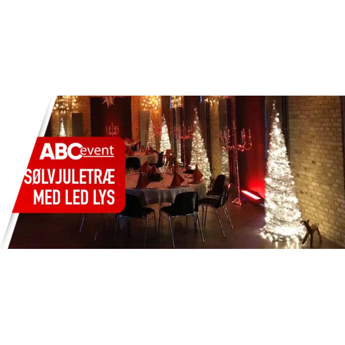 Eight shirts arranged on table in black, olive, grey, blue, white, red, mustard, and green.