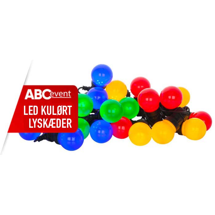 Eight shirts arranged on table in black, olive, grey, blue, white, red, mustard, and green.