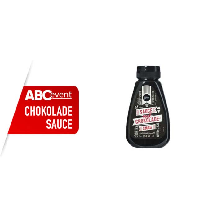 Eight shirts arranged on table in black, olive, grey, blue, white, red, mustard, and green.